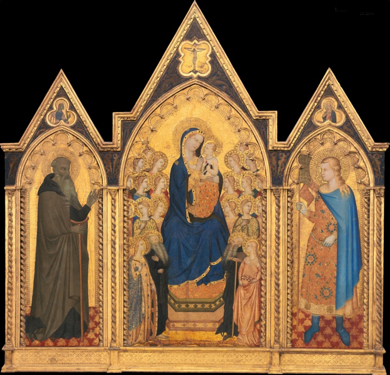 Gothic triptych on gold ground by Allegretto Nuzi and Puccio di Simone, 1354: the Virgin in a blue mantle enthroned with the Christ Child holding a goldfinch, surrounded by eighteen angels and four saints; on the left wing Saint Anthony Abbot in a brown habit with staff; on the right wing the young Saint Venantius with a banner, in a red-gold brocade tunic and blue cloak; Crucifixion and Annunciation in the pinnacles