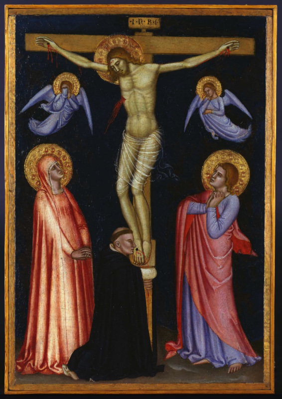 Small devotional panel attributed to Andrea di Bonaiuto showing the Crucifixion against a dark blue ground: Christ on the cross between two mourning angels, the Virgin in a rose mantle and St John the Evangelist below, and a tonsured Dominican friar in black cappa kneeling and embracing the foot of the cross, tempera and gold on panel, 1370-77, Pinacoteca Vaticana