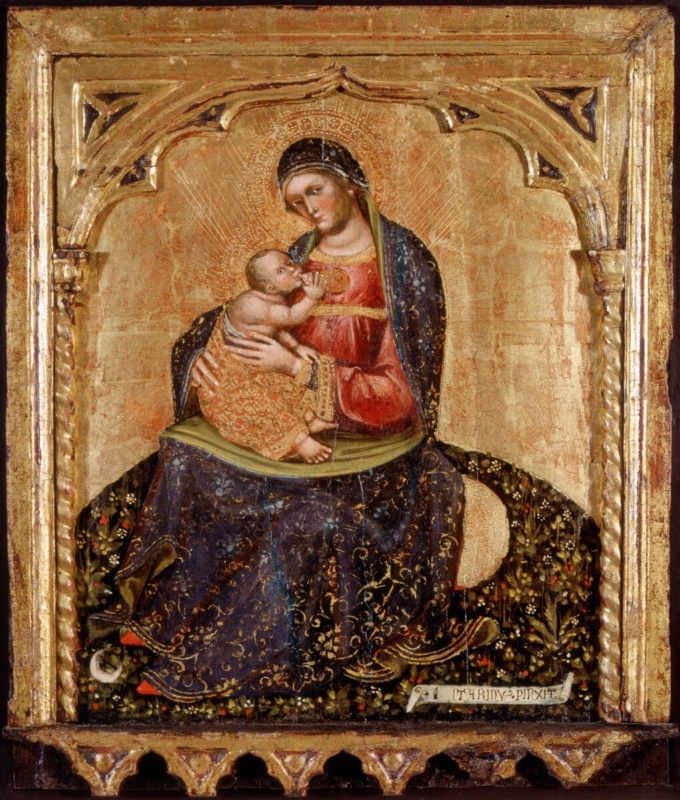 Small gold-ground panel in a gilded frame with a cusped arch and twisted colonnettes. The Virgin, in a dark blue mantle with fine gold scrollwork over a red dress, sits low on a flowering meadow and nurses the Child, who is wrapped in an orange and gold cloth. Gold rays spread from her figure, a white crescent moon lies at her feet, and a small scroll at the lower right carries the painter's signature
