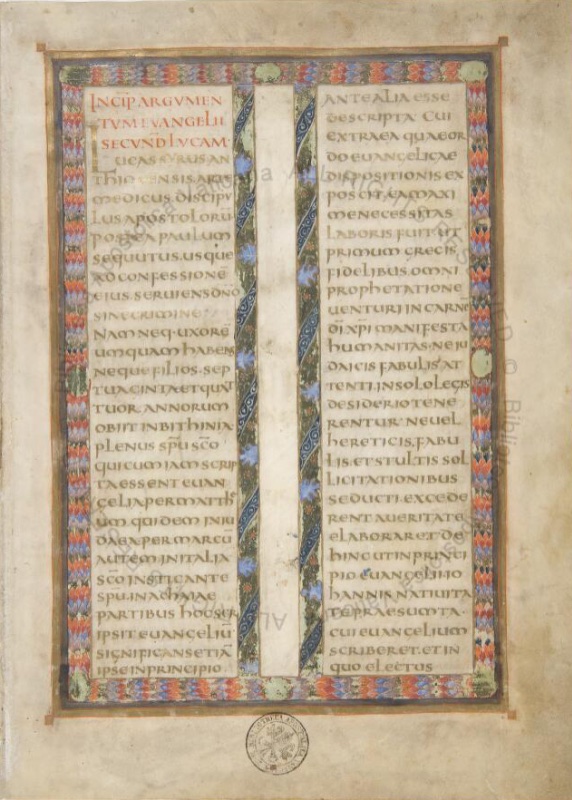 Folio from the Codex Aureus of Lorsch: the preface to the Gospel of Luke written in gold uncial letters in two columns, opening with a red rubric, the whole enclosed in a decorative frame of red, blue, green and gold palmette bands resembling precious textile