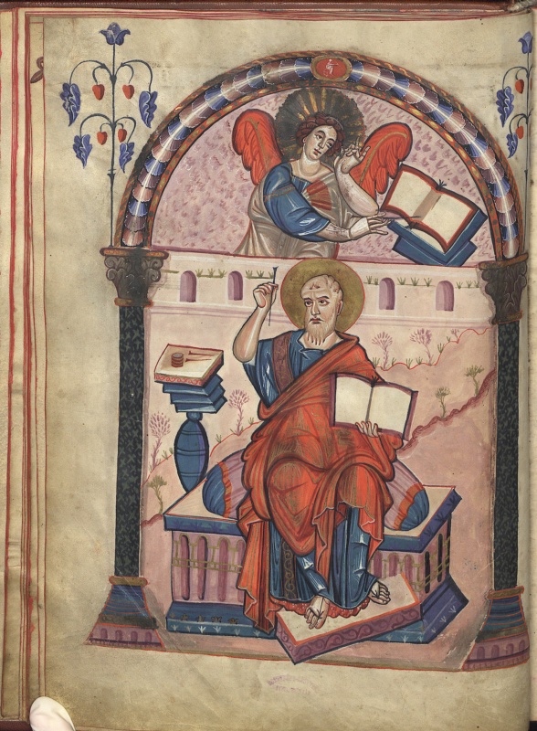 Evangelist portrait from the Codex Aureus of Lorsch: the bearded Saint Matthew seated on a cushioned throne in blue tunic and red mantle, holding an open book and raising a pen, while in the arched lunette above his symbol, a red-winged angel, bends over an open codex on a lectern, pen in hand, framed by columns and flowering stems