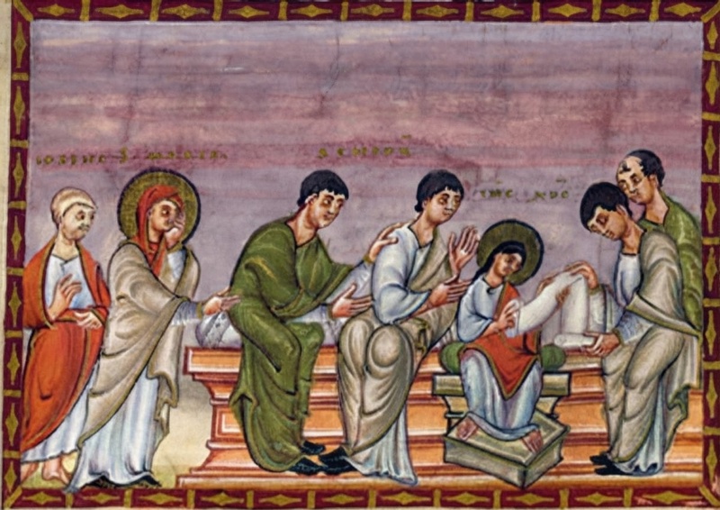 Medieval miniature in a red frame with gold ornament, against a streaked violet-rose ground: at left a white-haired man in a red mantle and a haloed woman in a red veil and grey mantle, her hand to her cheek, approach a group of dark-haired men seated on a long stepped bench with orange cushions, gesturing to one another; at right a haloed boy in a pale tunic and red mantle sits on a separate cushioned seat with a footstool, unrolling a white scroll whose end is held by a man facing him