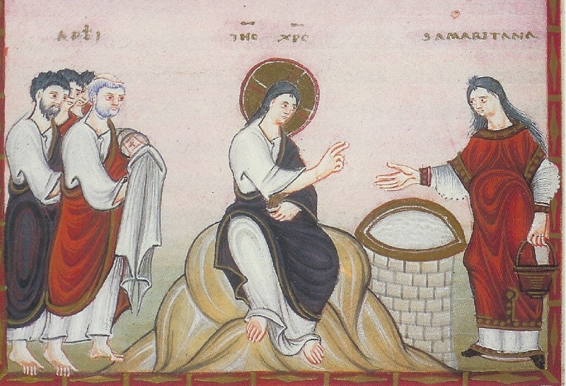 Medieval miniature in a red frame, on a pale violet-white ground: at centre a haloed Christ in a white tunic and violet mantle sits on a rocky mound and raises two fingers in speech; at right, beside a round masonry well filled with water, a woman with long loose hair in a white tunic and red garment holds a bucket and stretches out her hand towards him; at left a group of apostles, the foremost white-haired in a red mantle carrying a round object wrapped in a white cloth