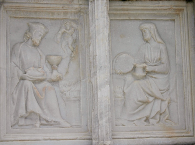 Fontana Maggiore, Perugia: January relief panels, a man with a goblet and his wife with bread at the winter hearth, 1278