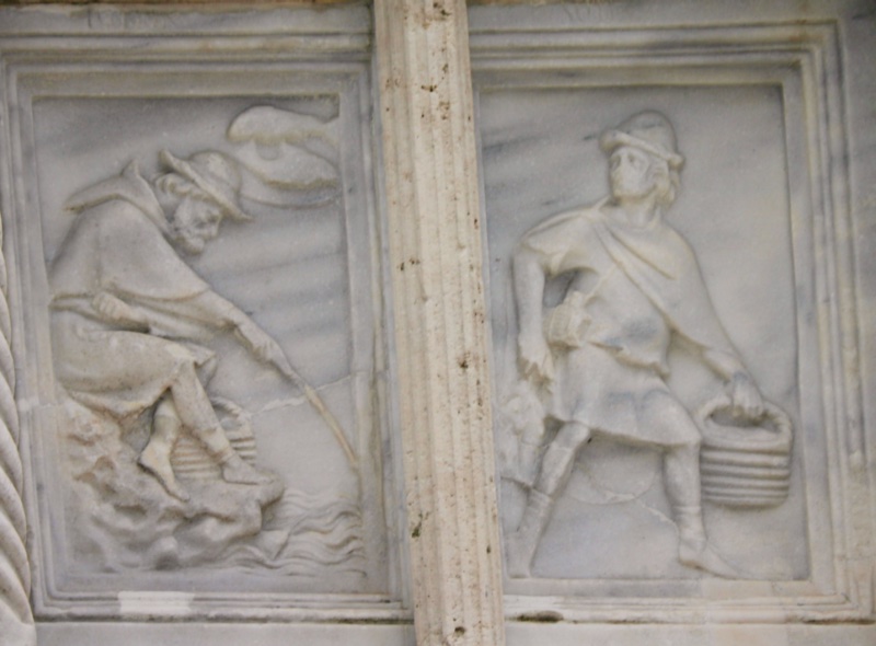 Fontana Maggiore, Perugia: February relief, a fisherman angling from a rock beneath the fish of Pisces, with his companion carrying the catch
