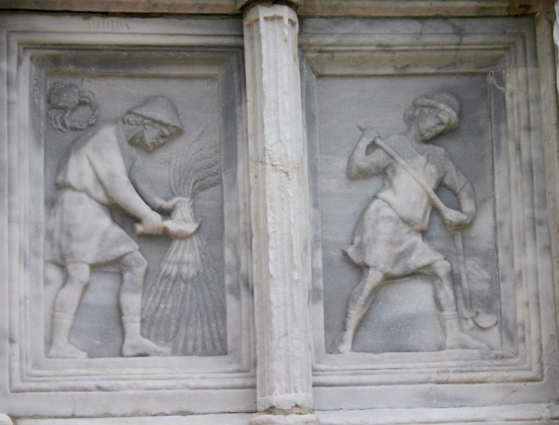 Fontana Maggiore, Perugia: June relief, a reaper binding a sheaf of wheat beneath the crab of Cancer, with a mower shouldering his scythe