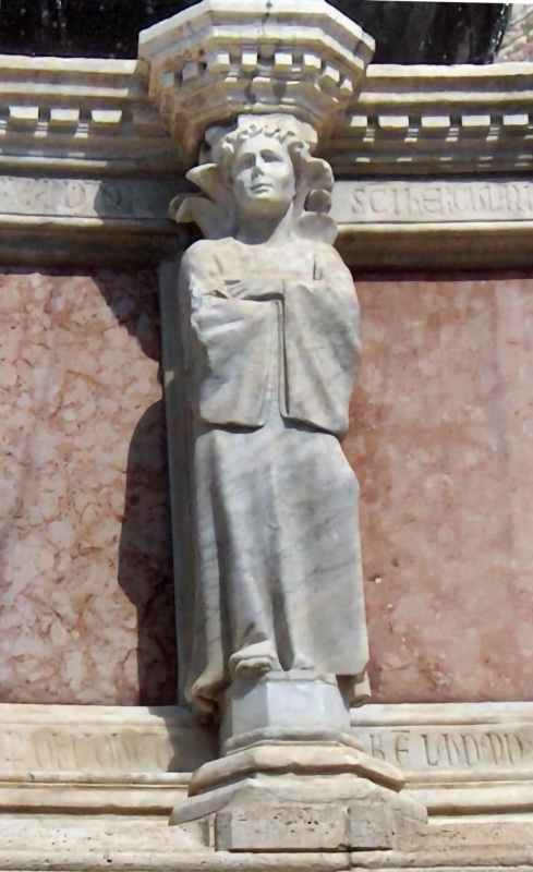 Fontana Maggiore, Perugia: statue of the traitor cleric of Sant'Ercolano, a young man with hands concealed in his garment, legend CLERICUS PRODITOR SANCTI HERCULANI, upper basin, 1278