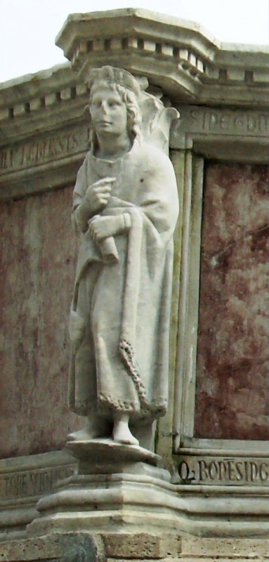 Fontana Maggiore, Perugia: statue of Euliste, legendary founder of Perugia, a long-haired youth with a diadem, raising one hand in speech and holding a scroll, 1278