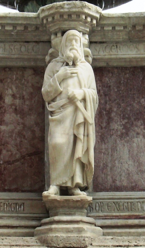 Fontana Maggiore, Perugia: statue of Melchizedek on the Fontana Maggiore in Perugia, an aged veiled priest with a long beard, one hand on his breast, beneath the titulus SACERDOS, 1278