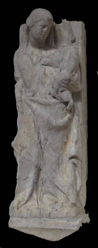 Tall narrow marble high relief attributed to Giovanni di Agostino, Pinacoteca Nazionale di Siena: a standing veiled Madonna, her head inclined toward the Child once carried on her left arm, the surfaces rough and abraded, the Child largely lost to a break, the drapery's fold system legible beneath an unfinished or weathered skin
