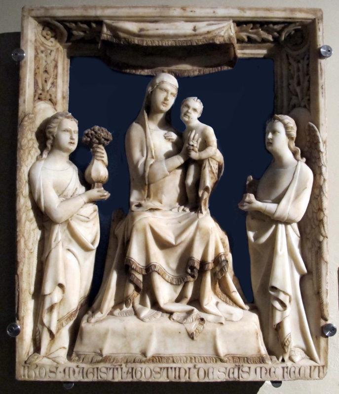Marble relief of the Madonna and Child enthroned between two standing angels beneath a carved canopy, signed by Giovanni di Agostino, c. 1330–1340, vestibule of the upper Oratory of San Bernardino, Siena. The sculptor's Latin signature runs along the lower frame