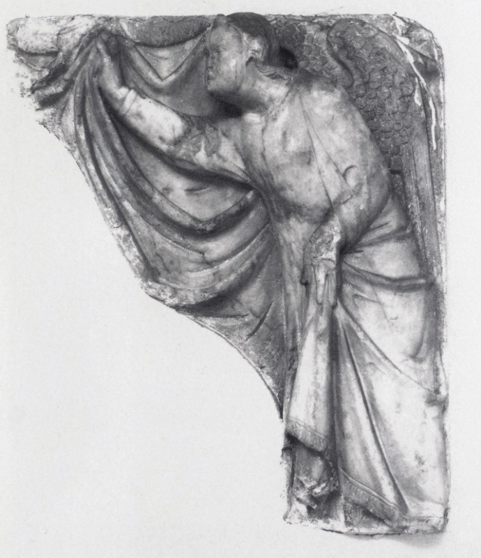 Fragmentary marble relief attributed to Giovanni di Agostino, c. 1331: a winged angel in profile leans left with its whole body, one raised hand gripping the gathered knot of a great curtain whose swags fill the upper corner, the other hand lowered to press the cloth against its hip; from a dismembered saint's shrine, Museo Diocesano d'Arte Sacra, Volterra