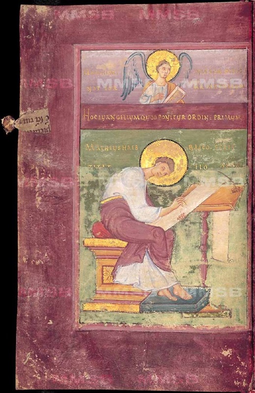 Ottonian manuscript page on purple-stained parchment. In a narrow upper register on a lilac ground, a half-length haloed angel with blue-grey wings holds a gold book, flanked by faded gold inscriptions. Below, a purple band carries a line of gold capitals beginning HOC EVANGELIUM. In the main field, on a green ground with areas of paint loss, the haloed evangelist Matthew, young and beardless, sits bent forward on a gold block throne with a red cushion. He wears a white tunic and a deep purple mantle and writes on a long sheet laid across a desk on a red turned stand. His bare feet rest on a blue-green footstool. Gold capitals beside his head name him. A small parchment tab with Gothic script projects from the left edge