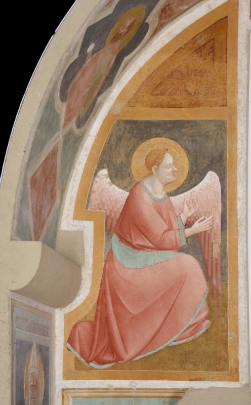 Fresco of the archangel Gabriel kneeling in profile to the right, in a rose-red robe with a turquoise sash, large pink wings open behind him, one hand raised in a speaking gesture, against a dark ground within an orange frame.