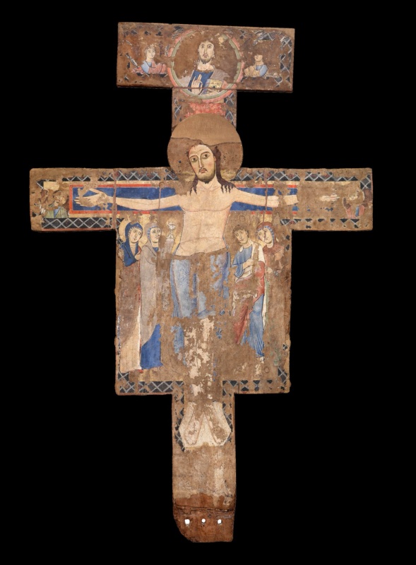 Twelfth-century painted cross: frontal living Christ with open eyes on a blue cross, blessing Redeemer between angels above, two mourning women at left, John and a woman at right; surface heavily worn and split
