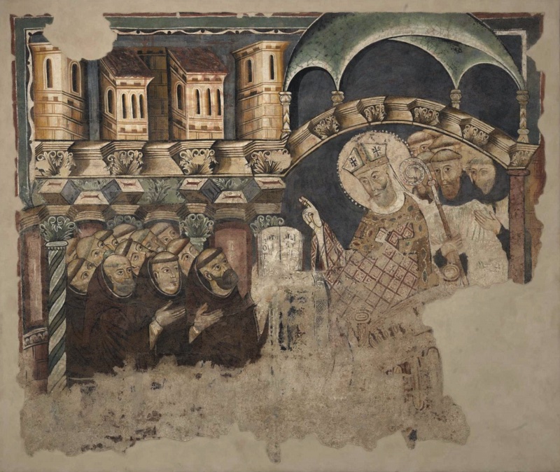 Fragmentary fresco of Saint Augustine in episcopal robes blessing gathered hermits beside an open Rule, beneath ornate arches and medieval buildings