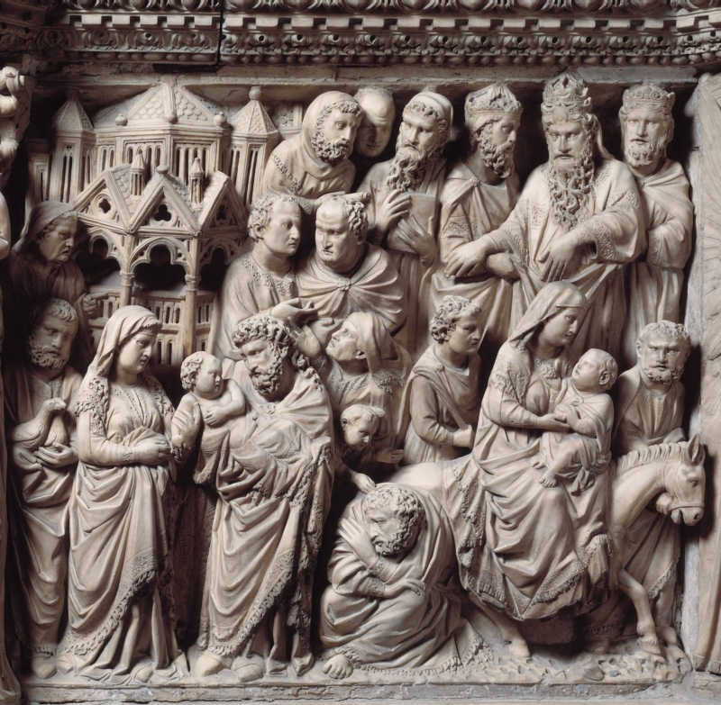 Densely carved marble relief: at the left a veiled woman holds two birds beside a bearded elder who receives an infant, before a small Gothic canopied building; ranks of bearded and mitred heads fill the centre and upper right; at the lower right a veiled woman sits sidesaddle holding a child and turns her head backward, with the head of an ass at the panel's edge.